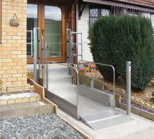 Terry Lifts TSL1000 Wheelchair Step Lift shown as an example of the type of lift to be installed under frameworks for Manchester City Council, Bradford Metropolitan District Council and Knowsley Metropolitan Borough Council