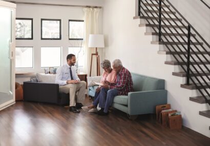 Senior, Couple, Meeting, With, Male, Financial, Advisor, At, Home