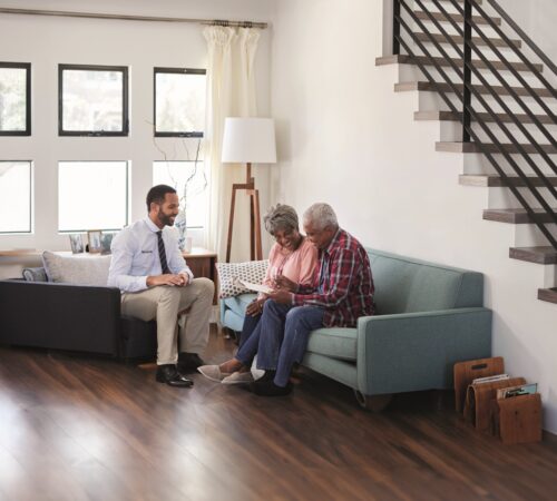 Senior, Couple, Meeting, With, Male, Financial, Advisor, At, Home